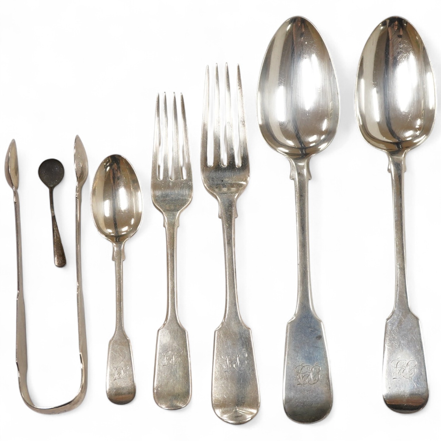 A harlequin part canteen of 19th century silver fiddle pattern flatware for six, comprising table spoons, table forks, dessert forks dessert spoons and teaspoons, various dates and makers but includes two sets, Wakely &